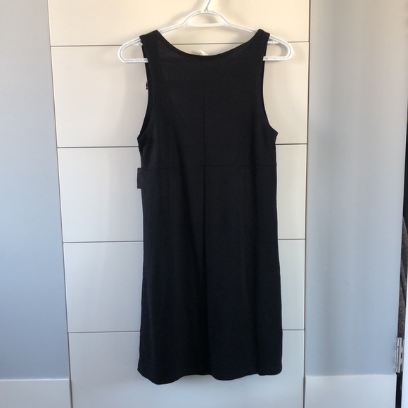 Simple black dress with button accents - Picture 2 of 4